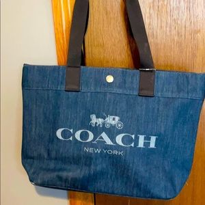 Coach midsize tote 15 in wide and 11 inches long